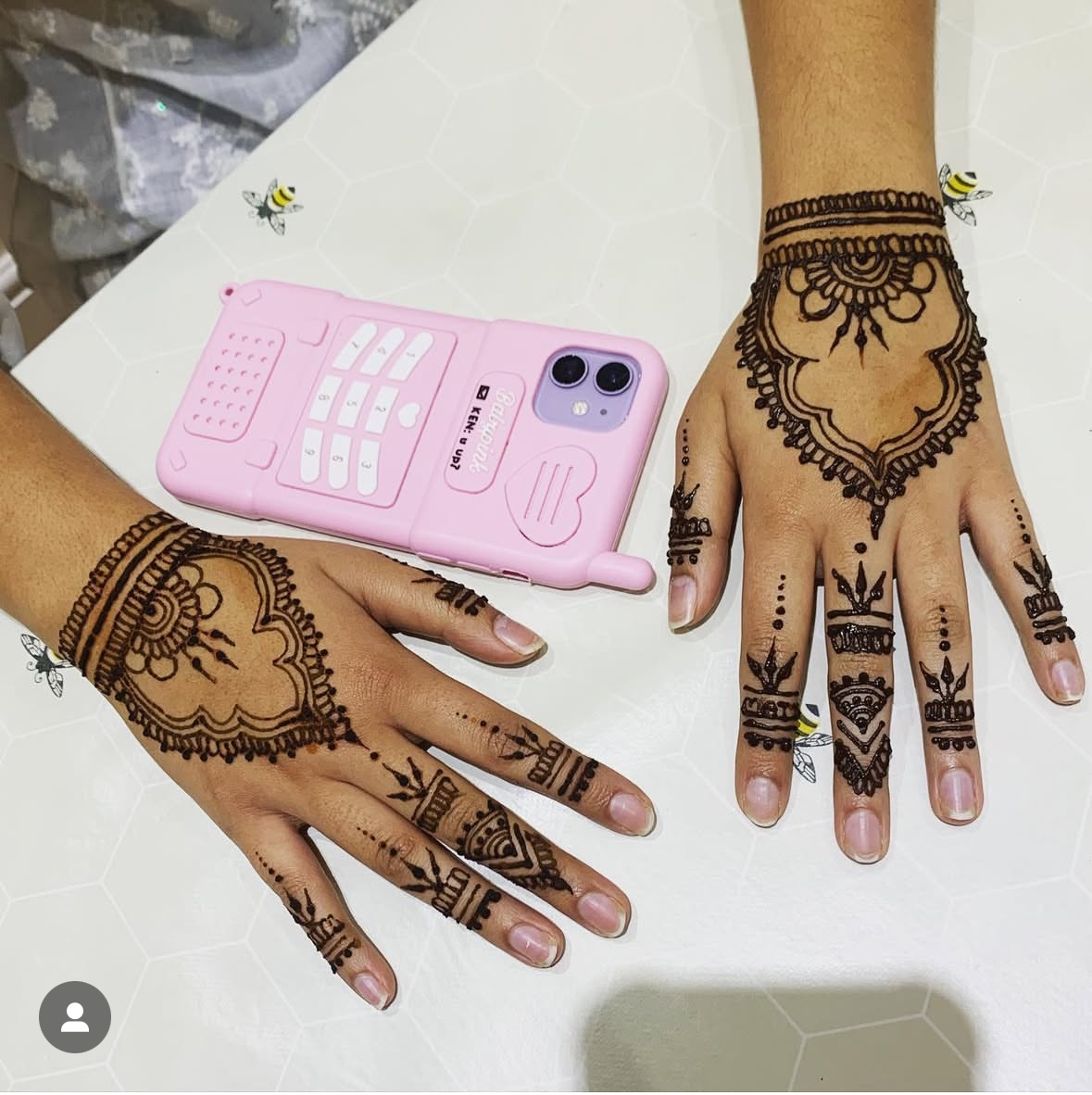Henna on two hands